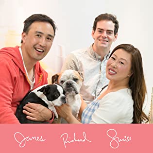 Three 100% PURE founders holding two dogs