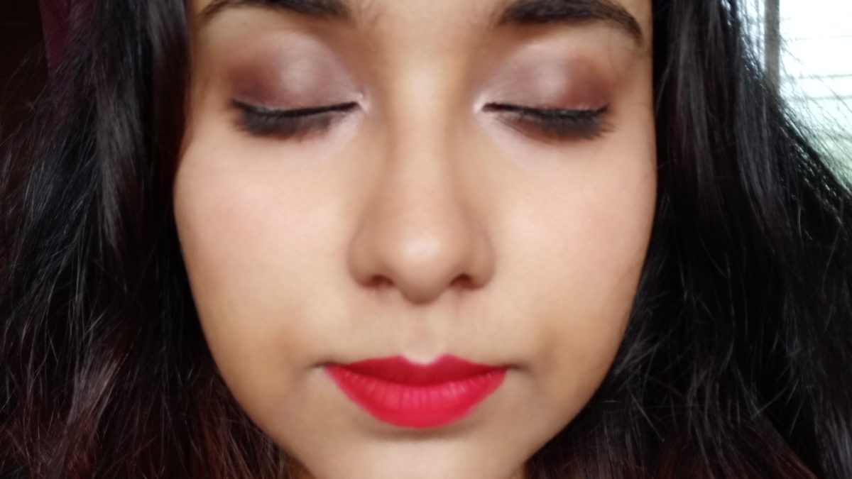 I tried to do a neutral eye with a bold lip.  How did I do it?