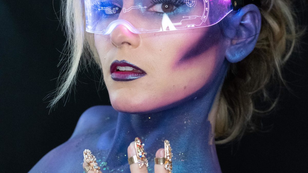 Performed with Mehron Paradise Body paint makeup and created this syfy inspired look.