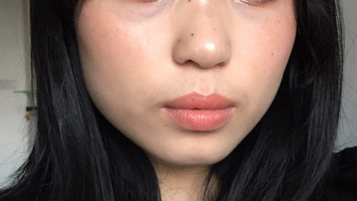 Rosy coral makeup with minimal base